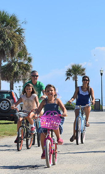 Family riding bikes