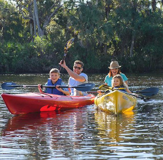 Family on kayaks
